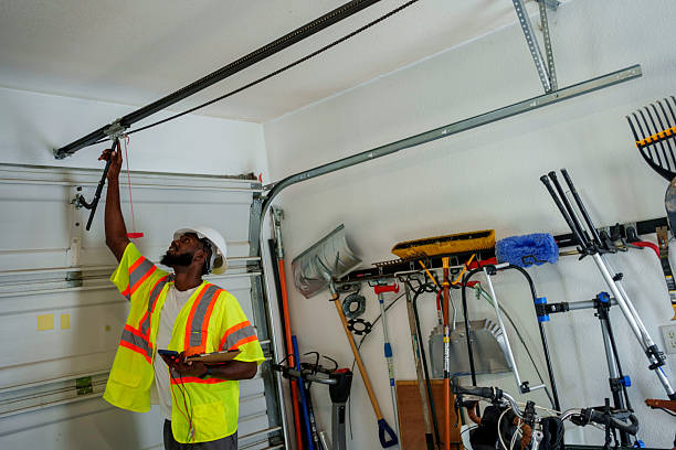 Professional Garage Door Panel Replacement technician working in Webberville, MI